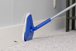 Wall Wizard™ cleaning baseboards